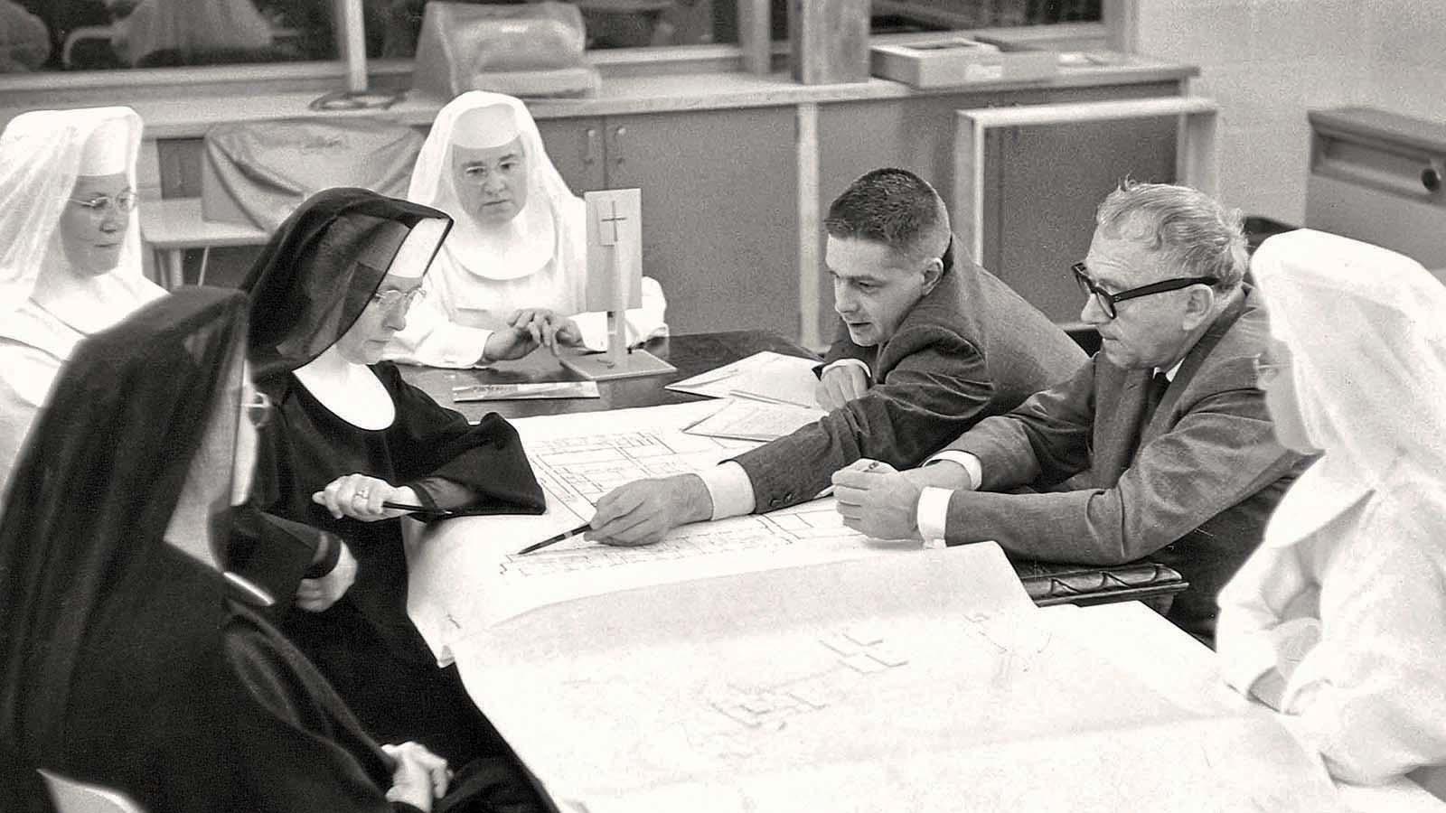  Marcel Breuer reviewing the architectural plans for Mary College with the Sisters.